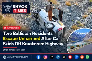 Car skids off the Karakoram Highway in Khyber, Gojal, with two occupants from Kachura, Baltistan, escaping unharmed.