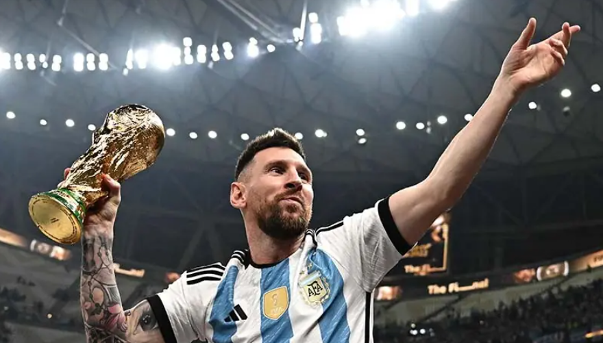 Lionel Messi holding Argentina jersey during emotional farewell after announcing retirement from international football