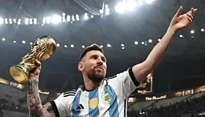 Lionel Messi holding Argentina jersey during emotional farewell after announcing retirement from international football